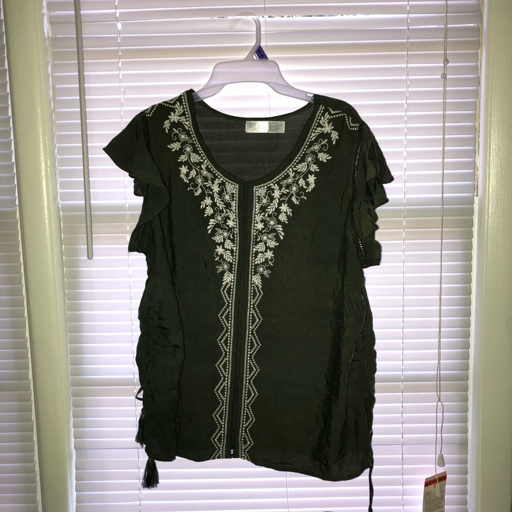 Woman’s navy green blouse